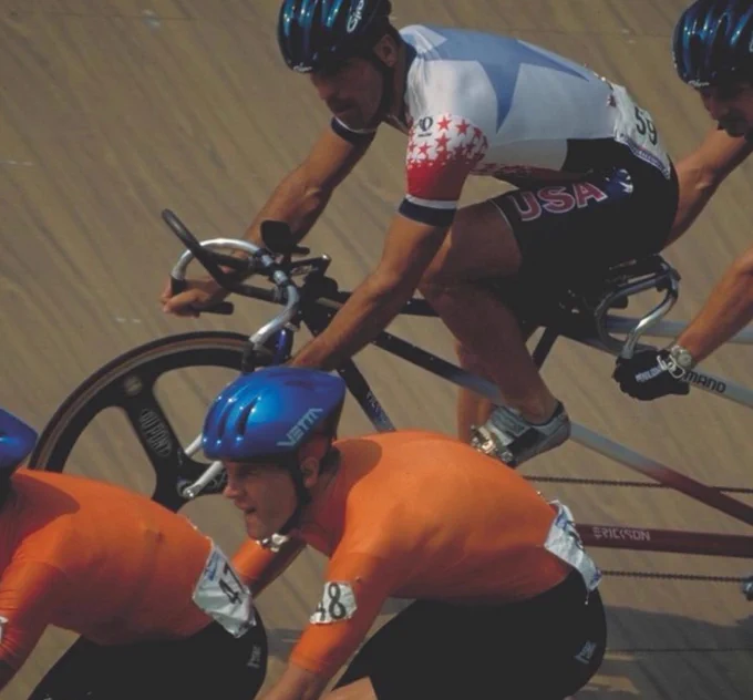 Two cycling athletes on the track