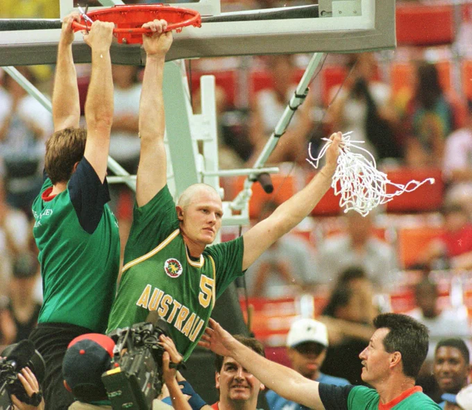 Troy Sachs hangs off the ring