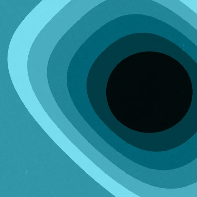 An image displaying different hues of blue in a pattern of overlapping oblong shapes.