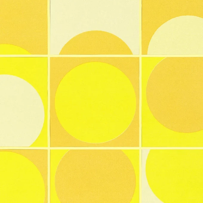 An image displaying different saturations of color using over lapping patterns of squares and circles in various shades of yellow.