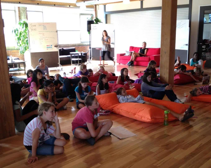 girls sitting on floor