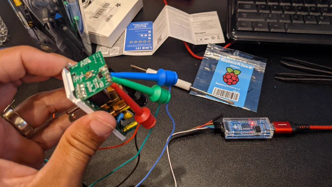 Sonoff S31 attached with test hook leads to USB to TTL serial adapter FT232RL