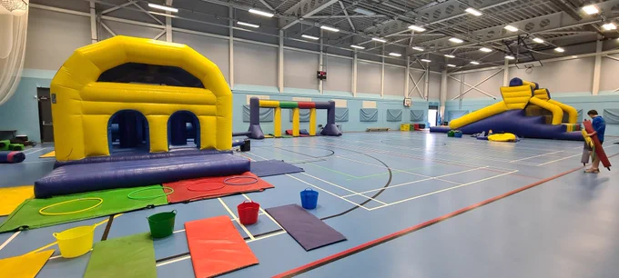 Large inflatables set up inside.