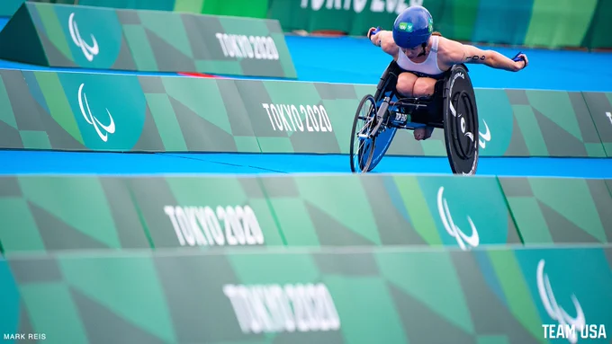 Kendall Gretsch races to the finish line in the women's PTWC triathlon at the Tokyo 2020 Paralympic Games.