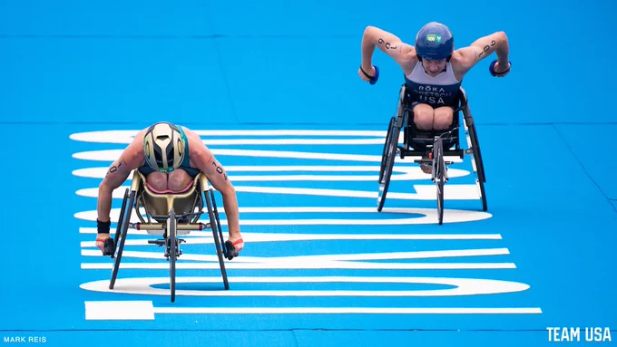 Kendall Gretsch races to the finish line to win the women's PTWC triathlon at the Tokyo 2020 Paralympic Games. She closes in on Australia's Lauren Parker in the last sprint to win the race.