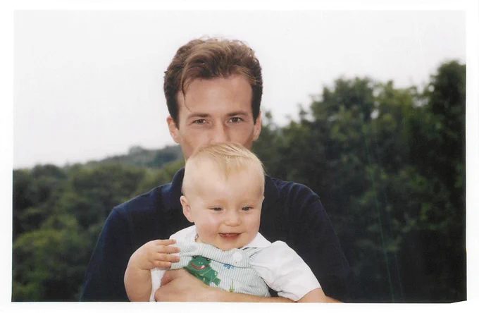 Kirsten Gillibrand's husband holds their son.
