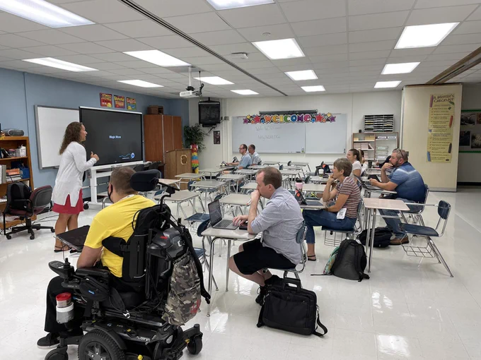 Teachers learning about technology during the WIRED Conference.