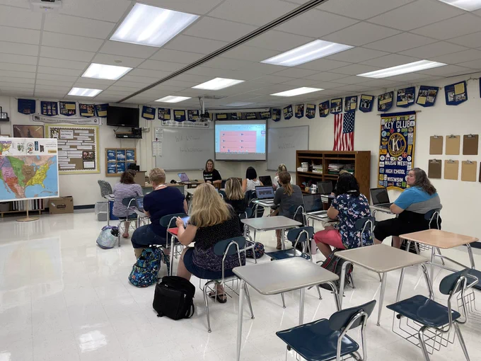 Teachers learning about technology during the WIRED Conference.