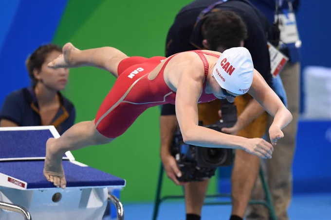 Canadian para-swimmer Aurelie Rivard jumping off the diving board to begin her race in the women's 400m Freestyle S10 Final at the Rio 2016 Paralympic Games.