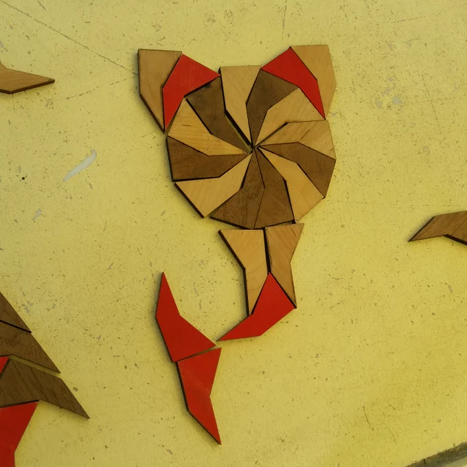 mermaid cat as described, made out of wooden pentagonal tiles