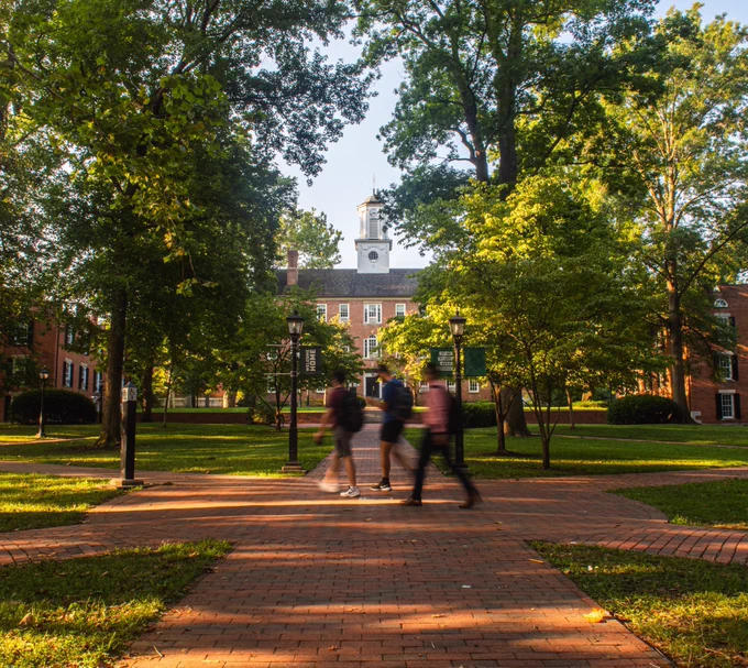 Students walk across College Green on Ohio University's Athens campus.