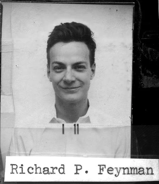 A black and white ID photo of a young man.