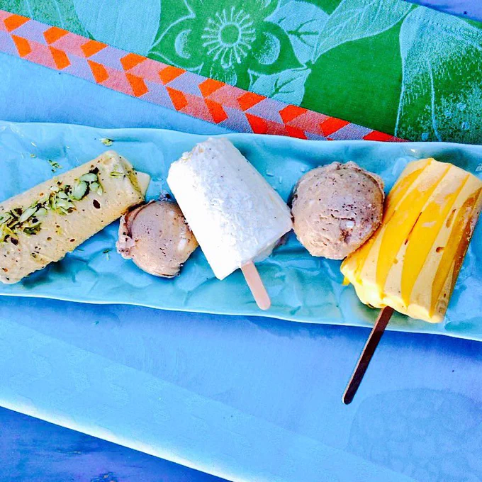 4 kinds of Kulfi (Indian ice cream) arranged on a platter.