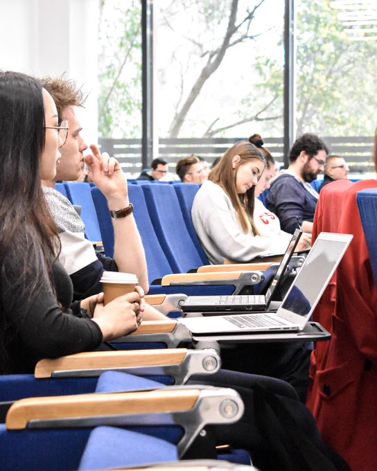 Student sitting in the auditorium