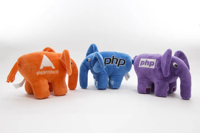 Photo of three PHP elephant plush toys