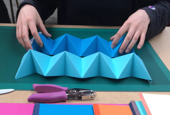 Paper folding using tools