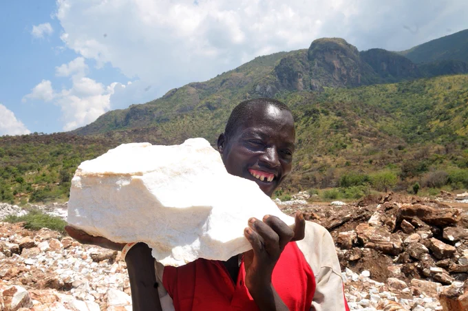 A member of the Lopsik Mining group in Lupa Moroto at work. The group mines marble and breaks it into smaller pieces for the local market. The group is one of the projects supported by UNDP in Karamoja sub-region in the recent past. It is mainly composed of the Youth and Women.
