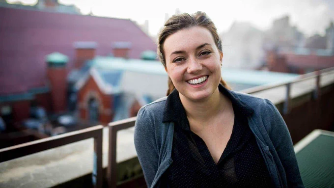 Kelly Speer, smiling, closeup and outdoor.