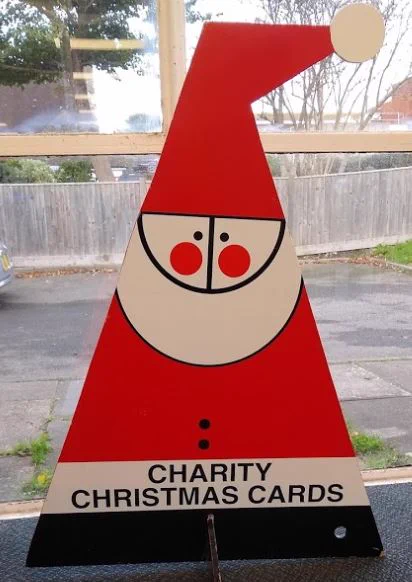 Sign for pop up charity Christmas card shop at Rustington Library
