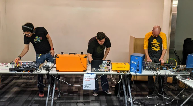 Three musicians and synthesizers
