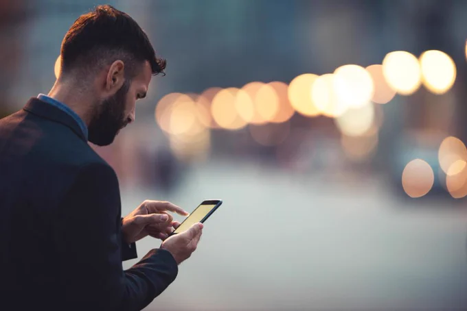 person looking at phone