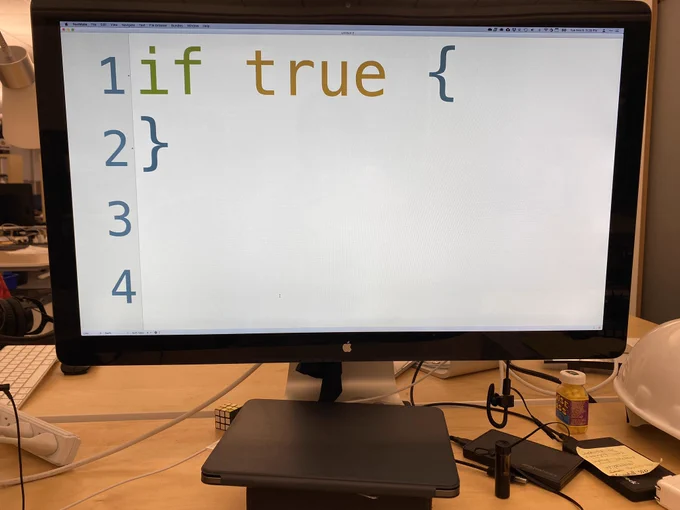 Photo of a computer monitor showing computer code with the code “if true {}” in giant letters. (It’s a reference to a dumb meme.)