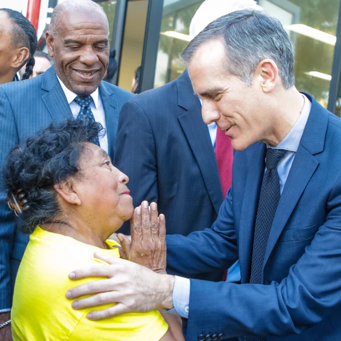 Mayor Garcetti embracing a person