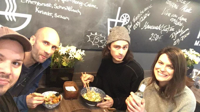 Four Ableton Devs sitting around a table in a restaurant