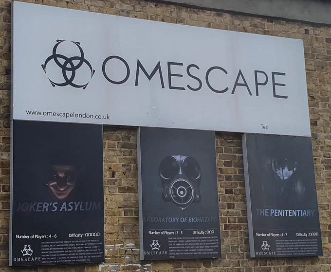 Signage outside the omescape escape rooms