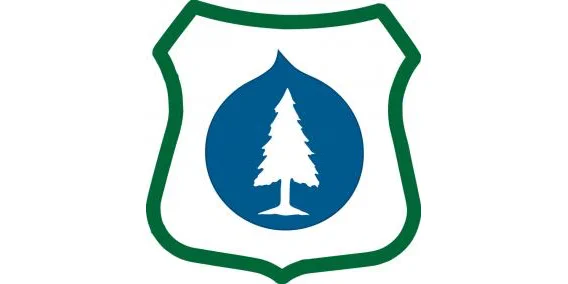 Badge logo with blue drop inside the badge and white tree outline in the blue drop
