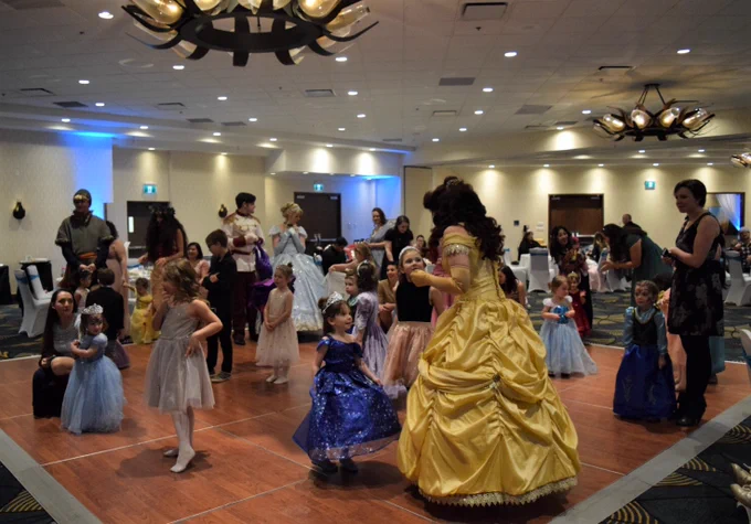 Children dancing with the Princesses and Princes