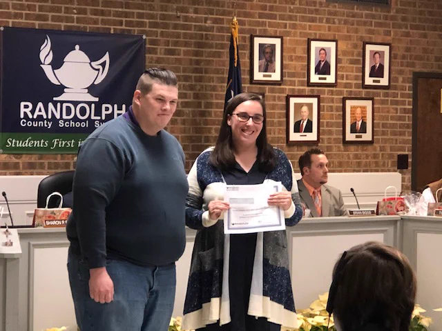 Media Specialist receives grant certificate.