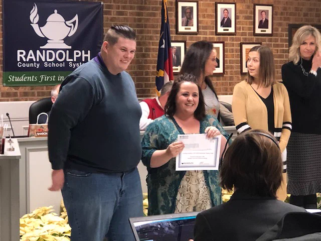 Media Specialist receives grant certificate.