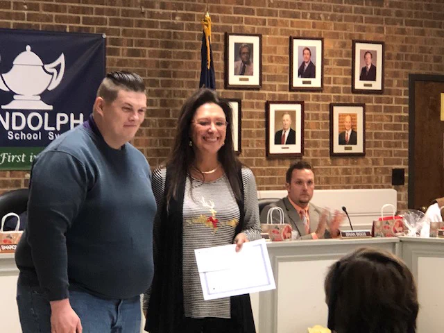 Media Specialist receives grant certificate.