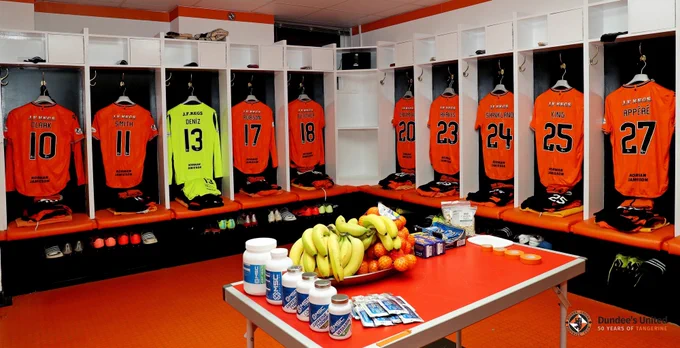 Kits hanging in dressing room.