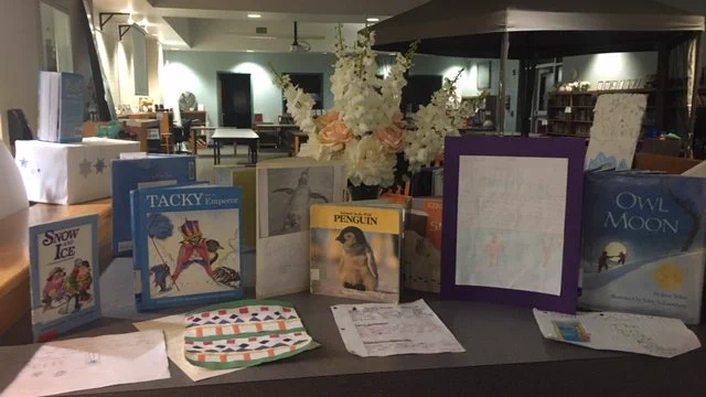 These book displays were created by students based on a book they were given during Reading Night.