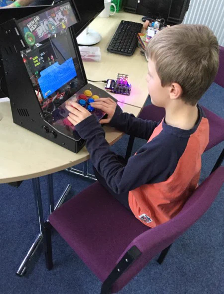 Boy planning retro games at Bognor Raspberry Jam