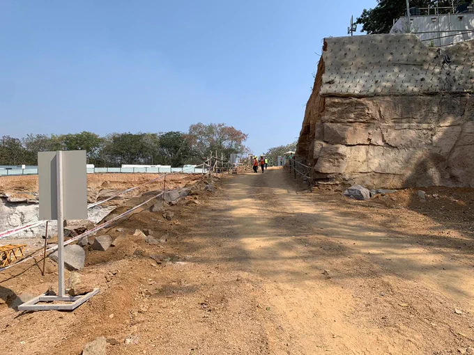 people walking up ramp for machinery access 