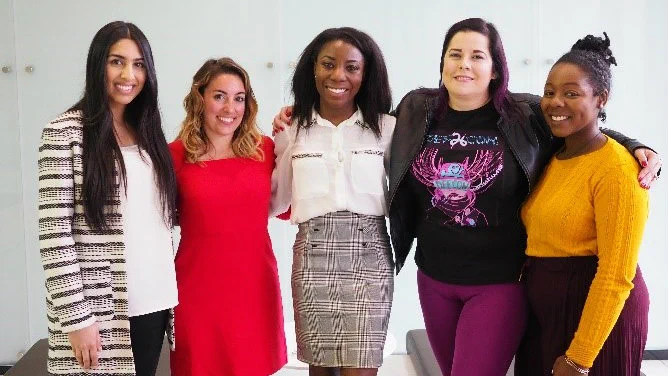 Amber and four smiling to the camera