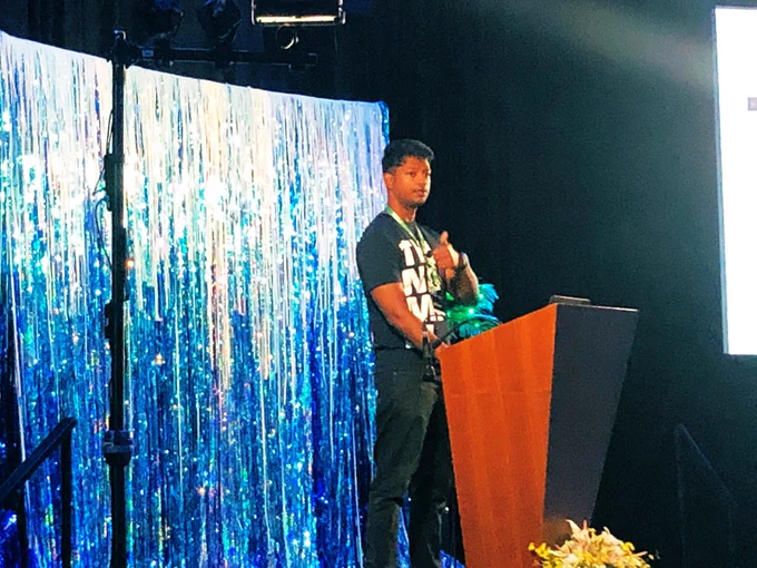 Dinesh on stage