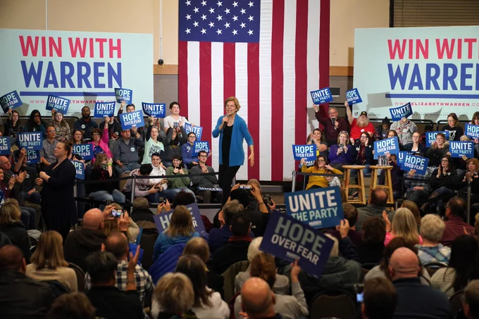 Crowd cheers for Elizabeth Warren.