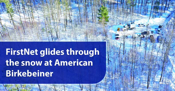 "FirstNet glides through the snow at American Birkebeiner," a FirstNet SatCOLT and other support vehicles parked in a snowy forested area, a path can be seen where the vehicles pushed through the snow.