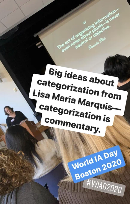 Lisa Maria Marquis presenting to the crowd. The screen behind her displays the quote “‘The act of organizing information—even notes about plants—is never neural or objective” attributed to Daniela Blei.