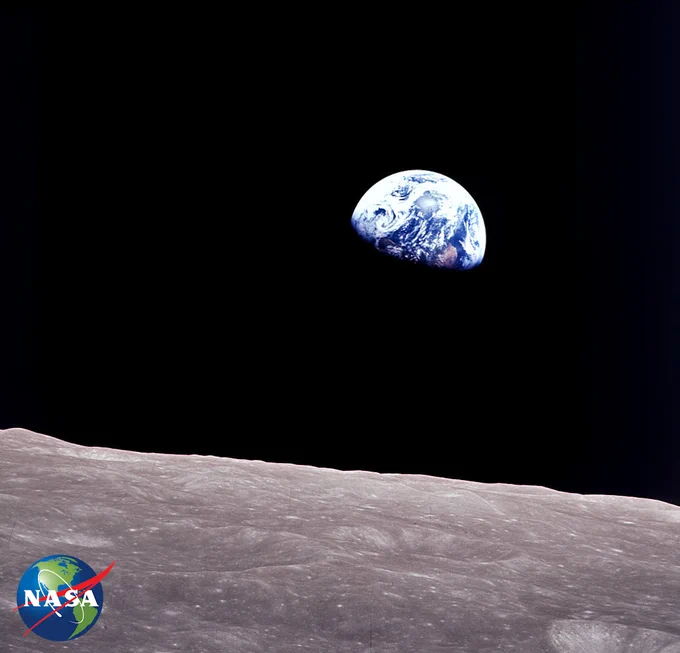 Iconic Earthrise image of Earth rising over the limb of the Moon with the NASA Earth Day logo in the bottom left corner