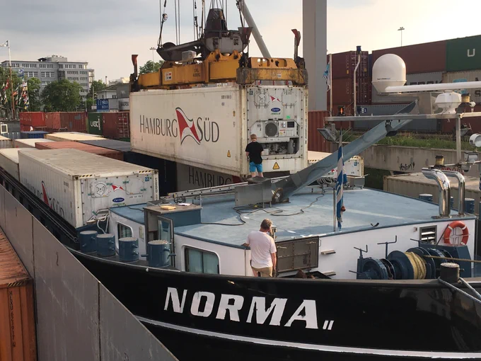 The Norma with reefer containers of different makes on the Rhine. : © Corneda Shipping