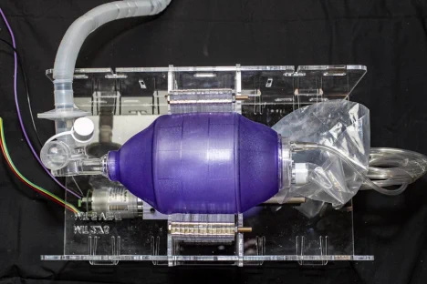 The new device fits around a blue Ambu bag, which hospitals already have on hand in abundance. 