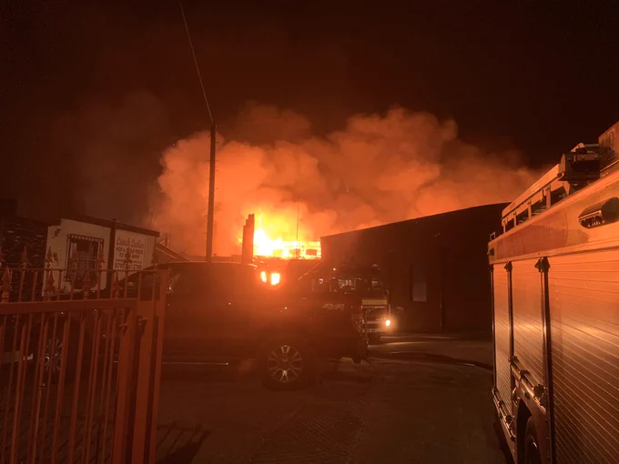 ‪A blaze involving a number of buildings on an industrial estate on Croft Street, Hyde‬
