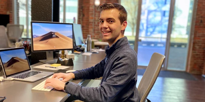 Alex Huey poses at his computer.