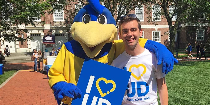 Alex Huey poses with YouDee.