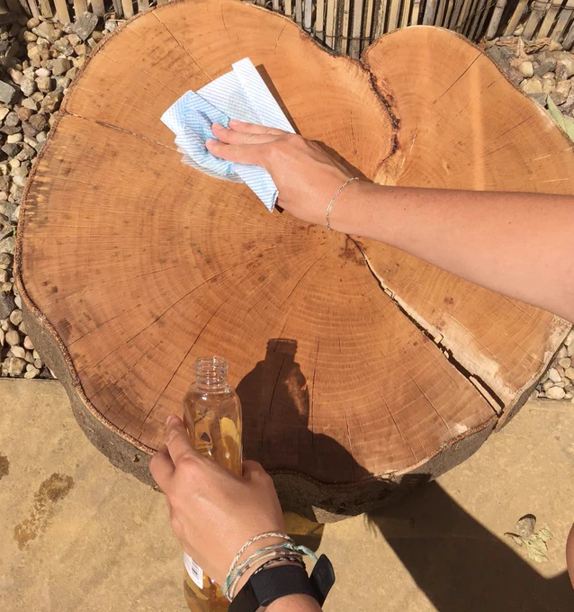 A picture of my log slice being coated with oil.